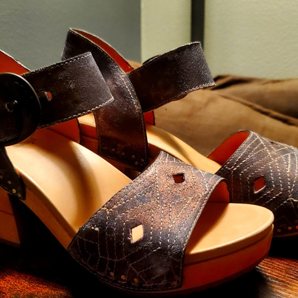 Dansko Wood outsole, handcrafted in Brazil. Beautiful bronze metallic leather
